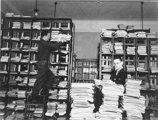 Allied investigators organizing Nazi documents during the Nuremberg Trials